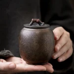 petit urne céramique noire dorée