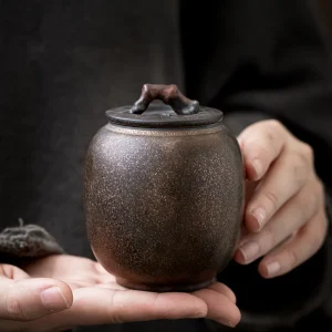 petit urne céramique noire dorée